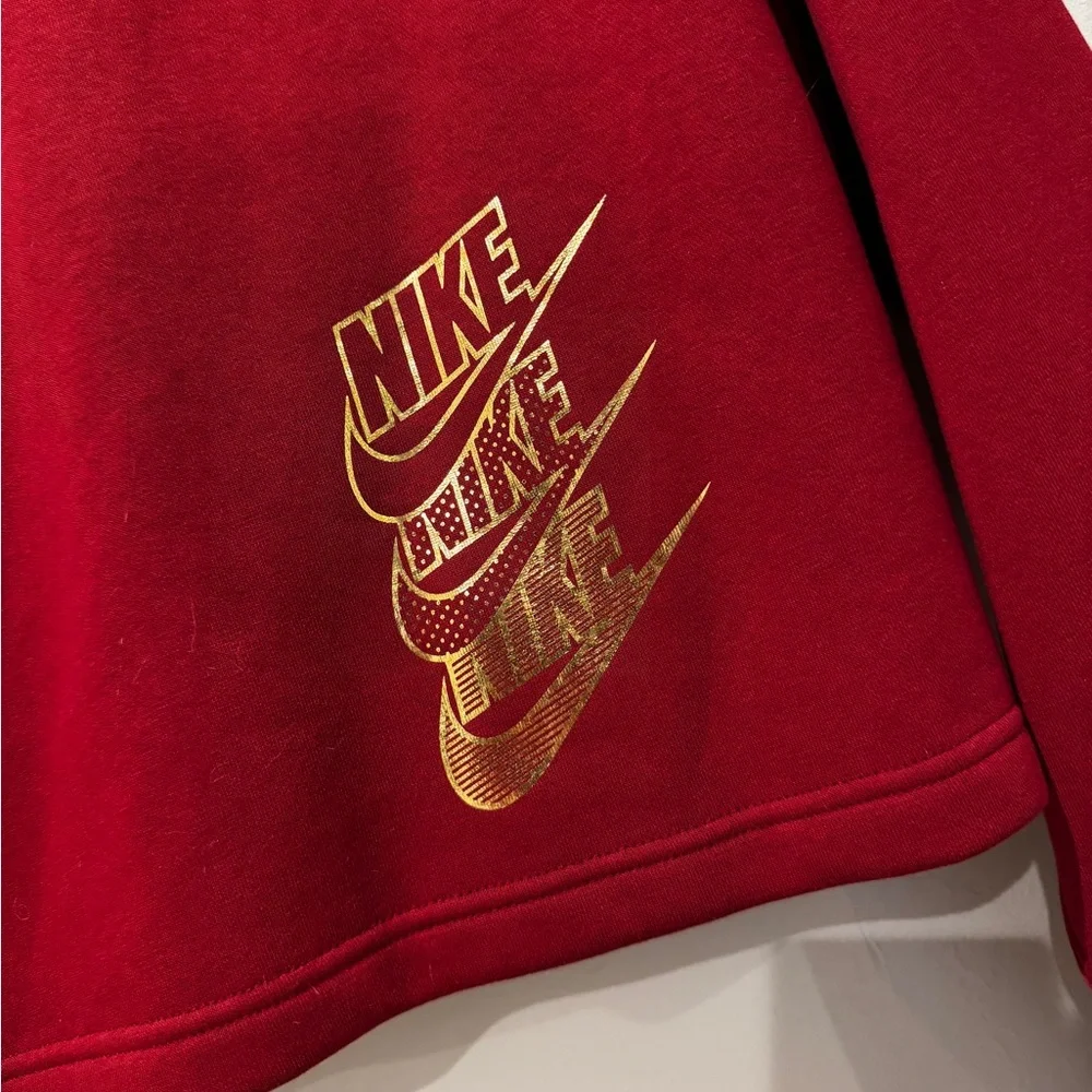 Nike Burgundy Half-Zip Sweatshirt with Gold Text